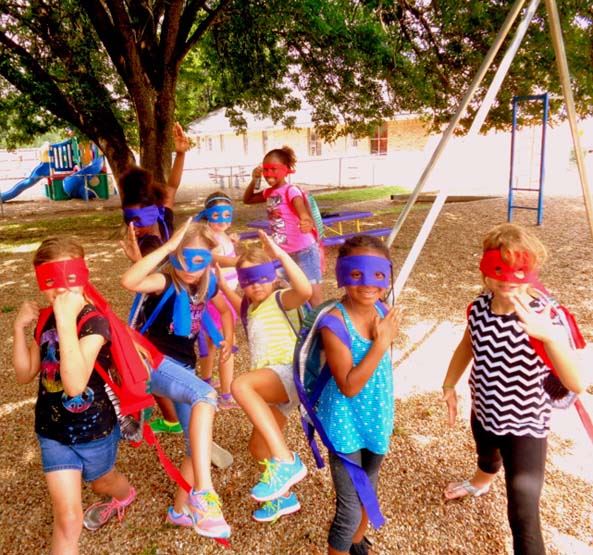 children dressed as super heroes